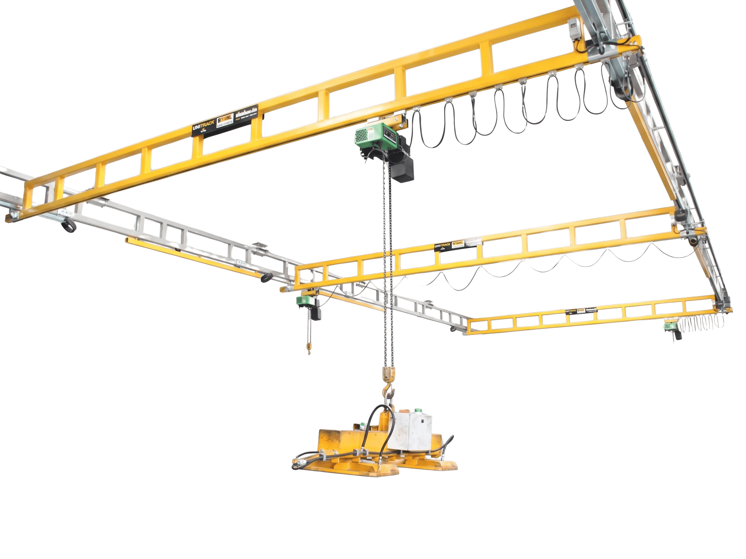 Overhead crane jib with yellow steel beams, pulleys, and a hanging hoist for lifting heavy loads.