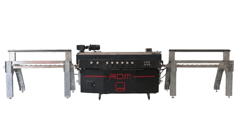 Large automated firearm mounted between two metal rails on a platform, featuring a scope and control panel for operation. Used as a precision weapon system on a stand.